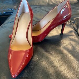 Red stilleto pumps. 3 inch + heel..Calvin Klein.